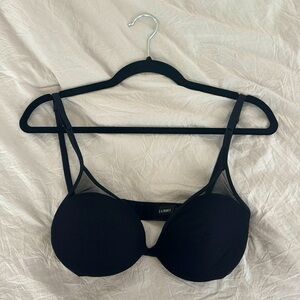 Black La Perla padded bra with sheer overlay. 36C